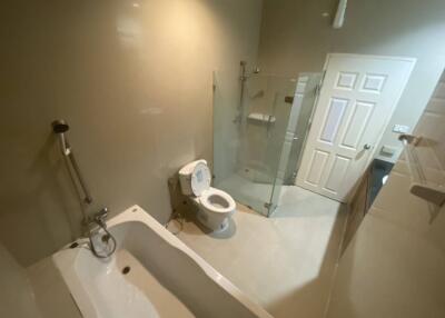 Modern bathroom with tub and shower