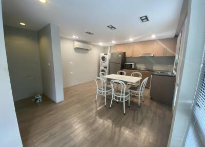 Modern kitchen and dining space with appliances