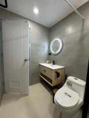 Modern bathroom with vanity and toilet