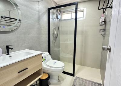 Modern bathroom with shower and vanity