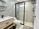 Modern bathroom with shower and vanity