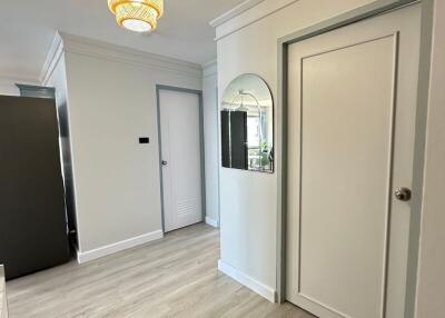 A modern hallway with stylish lighting