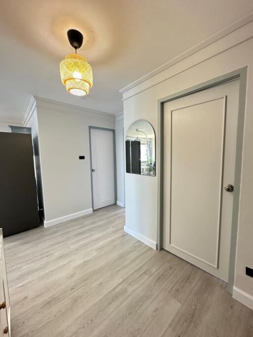 A modern hallway with stylish lighting