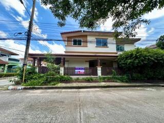 Exterior view of a two-story house with a 