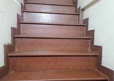 Wooden stairs leading to an upper floor