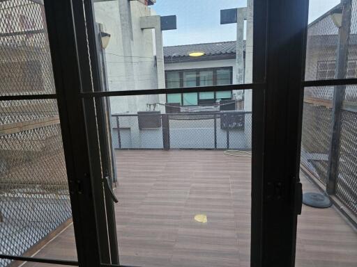 Balcony view with ceramic flooring and metal railing