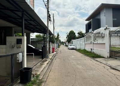 View of a residential street with houses on both sides