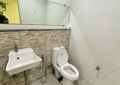 Modern bathroom with sink and toilet