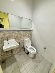 Modern bathroom with sink and toilet