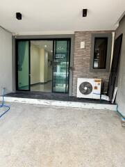 Front entrance of a property with sliding glass door