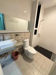 Modern bathroom with shower and vanity