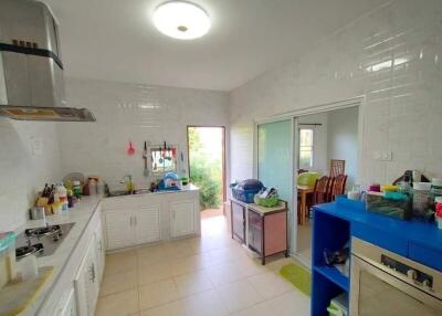 Modern kitchen with ample storage and natural light