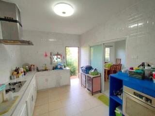 Modern kitchen with ample storage and natural light