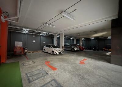 Spacious underground parking area with multiple car parking slots.