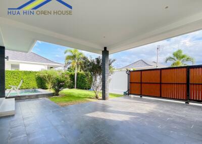 Spacious outdoor area with covered patio