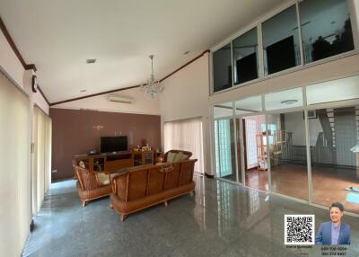 Spacious Living Room with High Ceiling