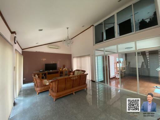 Spacious Living Room with High Ceiling