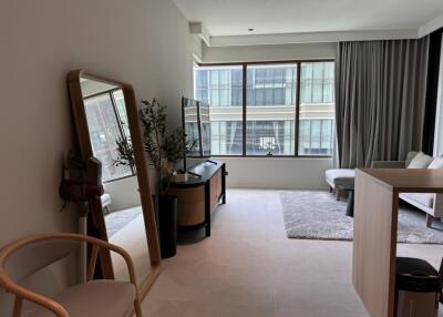 Modern living room with large window and minimalist decor