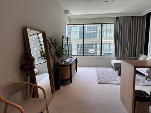 Modern living room with large window and minimalist decor