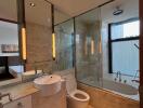 Modern bathroom with glass shower and bathtub