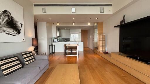 Living area with kitchen in background