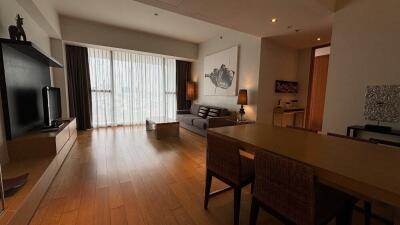 Spacious living room with wooden floor and modern furniture