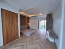 Modern bedroom with wooden accents and balcony