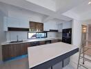 Modern kitchen with island, appliances, and sleek design