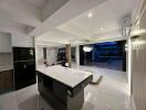 Modern kitchen with island and patio view