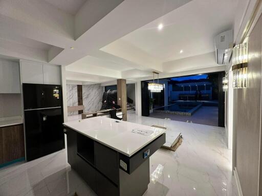 Modern kitchen with island and patio view