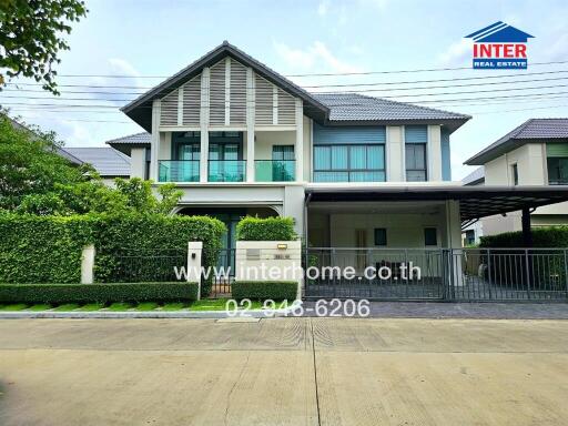 Modern two-story house with a well-kept front yard