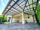 Exterior view of a modern house with a covered carport