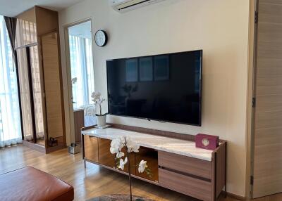 Modern living room with TV and stylish furniture