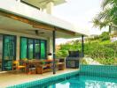 Outdoor patio area with dining table and pool