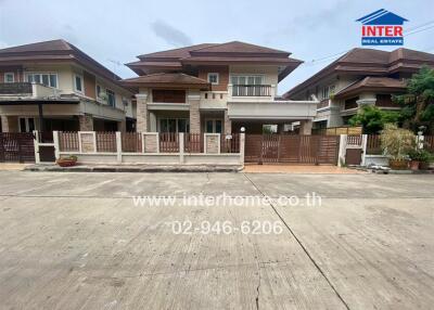 Front view of a residential house with a driveway