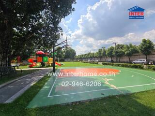 Outdoor basketball court and playground in a green park