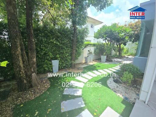 Beautifully landscaped garden with stepping stones