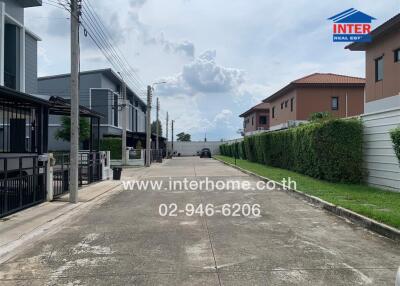 View of the neighborhood street with houses on both sides