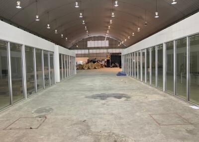 Spacious empty commercial building with glass partitions