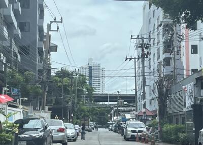 Street view with buildings and parked cars