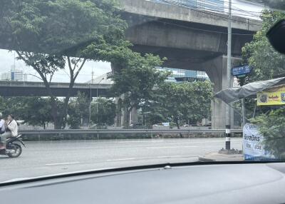 View of a street with overpasses and greenery