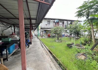 Backyard with garden and storage area