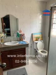 Bathroom with sink and toilet