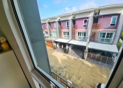 View from window showing residential townhouses