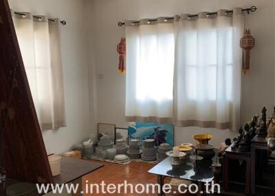 Bedroom with natural lighting and traditional decor