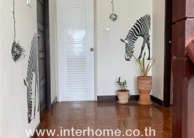 Hallway with zebras wall decorations