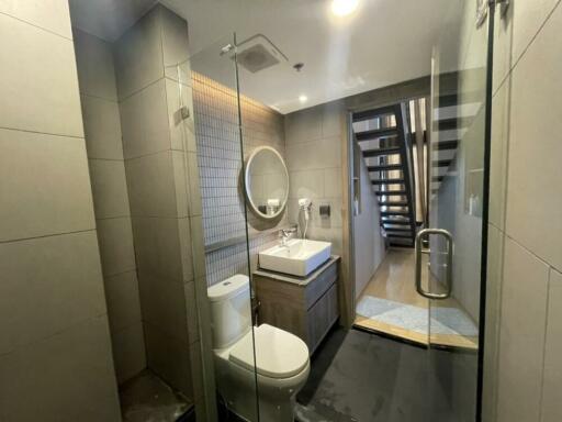 Modern bathroom with glass shower door