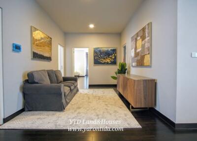 Modern living room with wall art and furniture