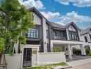 Modern two-story house with a landscaped front yard