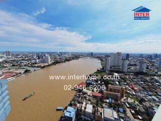 Aerial view of a river with buildings and city skyline